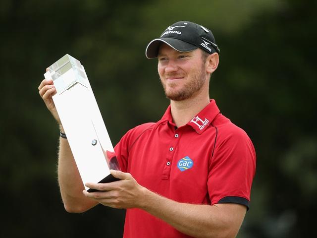 A happy Chris Wood with the BMW PGA Championship trophy